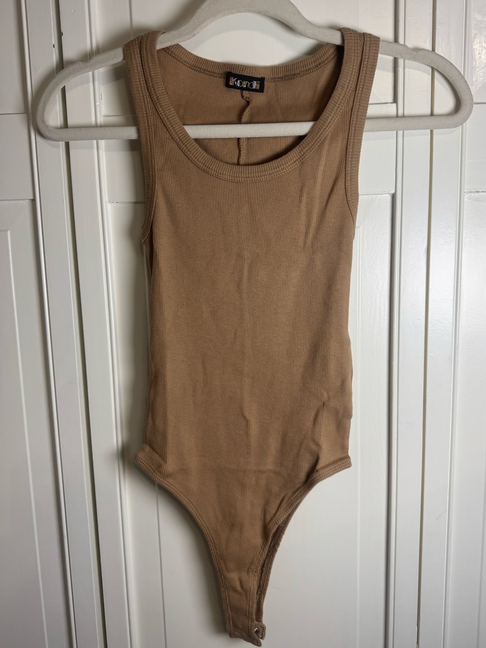 Suzi Kondi Ribbed Sleeveless Bodysuit in Tan